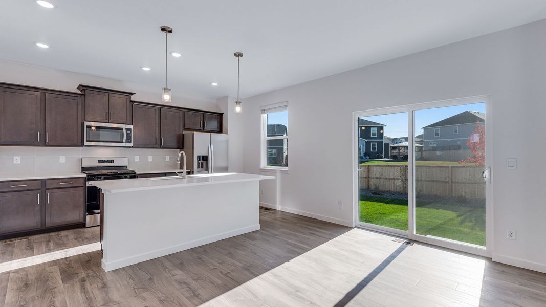 Furnished interior view inside a new home in Trails at Crowfoot, Parker (Image 6).