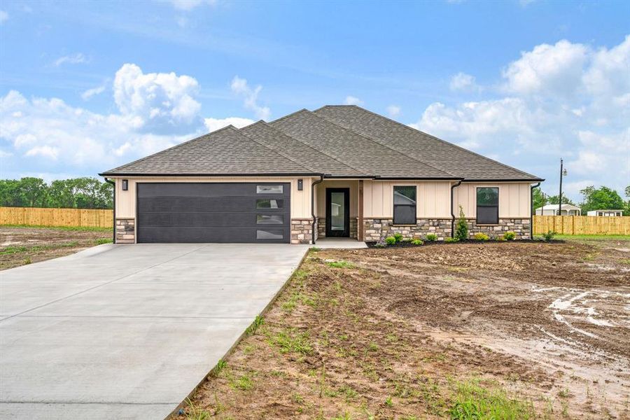 Front exterior of a new home in , Sumner, TX, highlighting curb appeal (Image 17). Front exterior of a new home in , Sumner, TX, highlighting curb appeal (Image 17).