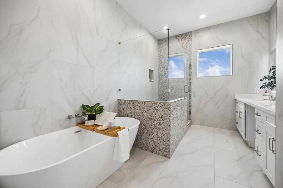 Soak away the stress of the day in the spa-like freestanding tub. Soak away the stress of the day in the spa-like freestanding tub.