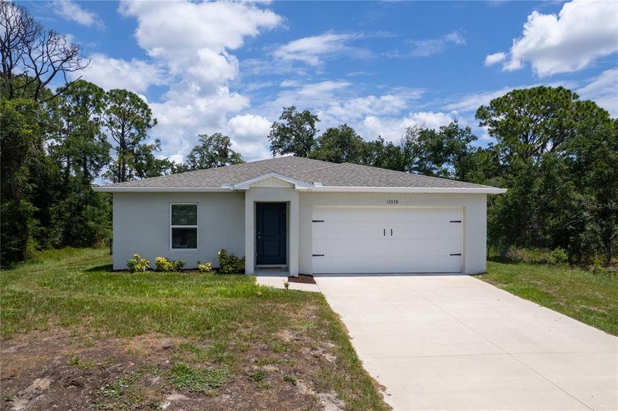 Front exterior of a new home in , Port Charlotte, FL, highlighting curb appeal (Image 2). Front exterior of a new home in , Port Charlotte, FL, highlighting curb appeal (Image 2).