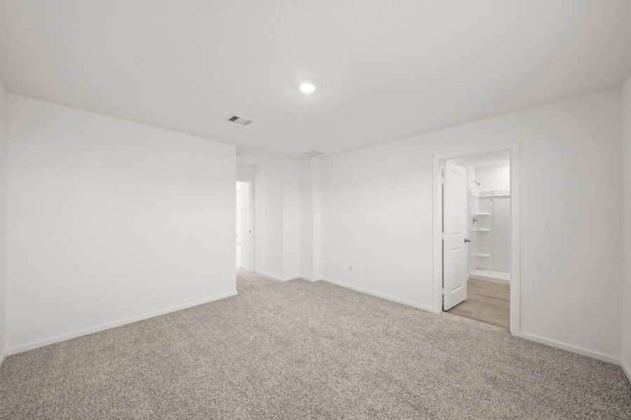 Spacious, unfurnished interior of a new home in The Canopies, Splendora (Image 14).
