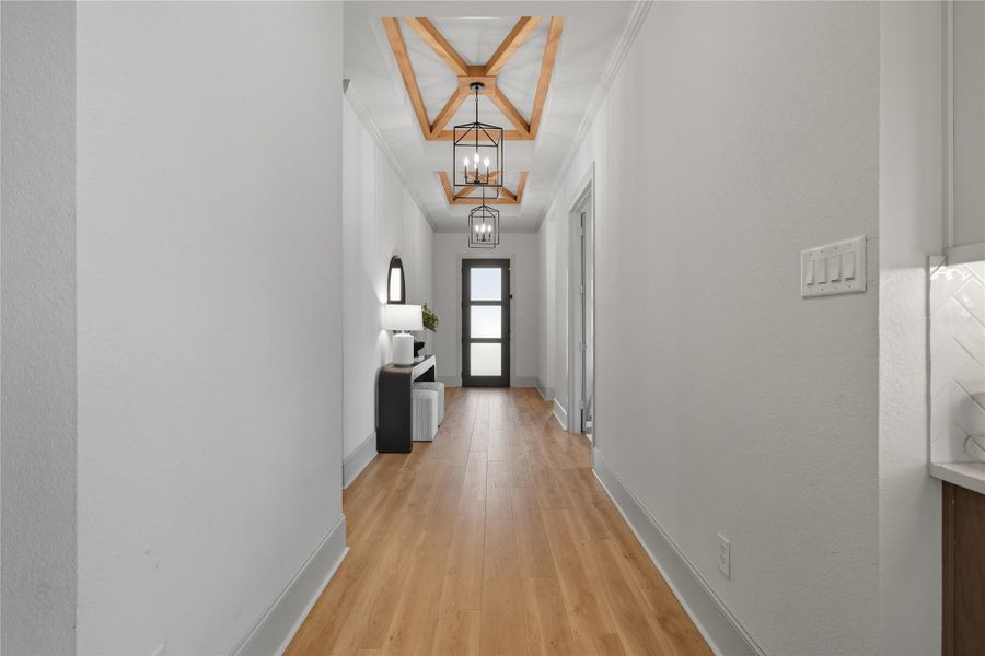 Beautiful front hallway with custom wood beams Beautiful front hallway with custom wood beams