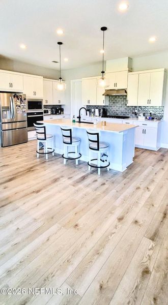 Furnished interior view inside a new home in , St. Johns (Image 10).