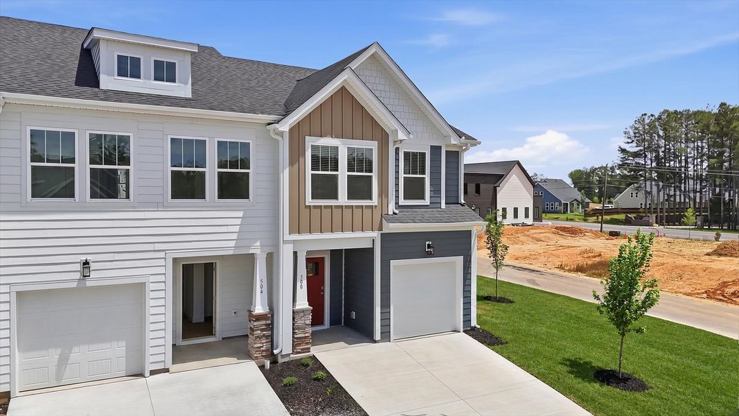 Front exterior of a new home in Barton Hollow, Fountain Inn, SC, highlighting curb appeal (Image 2). Front exterior of a new home in Barton Hollow, Fountain Inn, SC, highlighting curb appeal (Image 2).