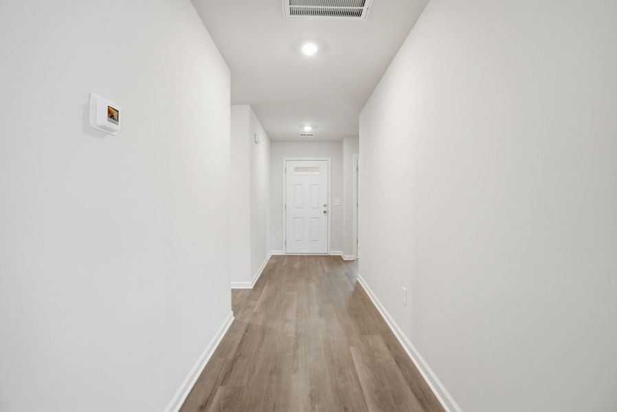 Representative unfurnished interior of a home built from the Spruce L by McGuinn Homes in Sibley Village, Sumter (Image 12).