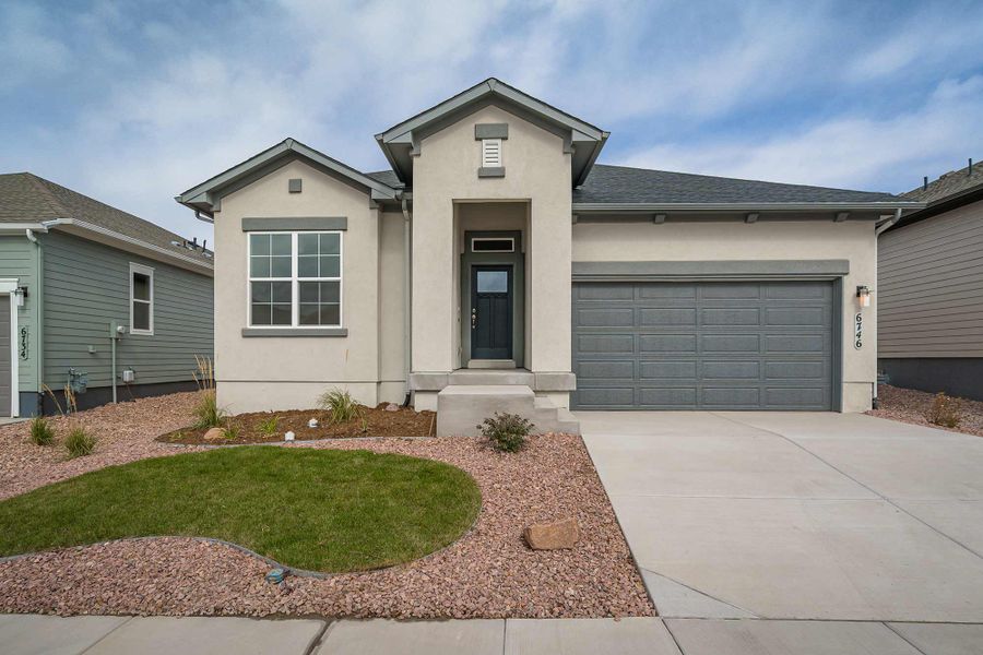 Representative exterior photo of a completed home built from the The Tibbetts by David Weekley Homes in Wolf Ranch - Enclave Collection, Colorado Springs, CO (Image 1). Representative exterior photo of a completed home built from the The Tibbetts by David Weekley Homes in Wolf Ranch - Enclave Collection, Colorado Springs, CO (Image 1).