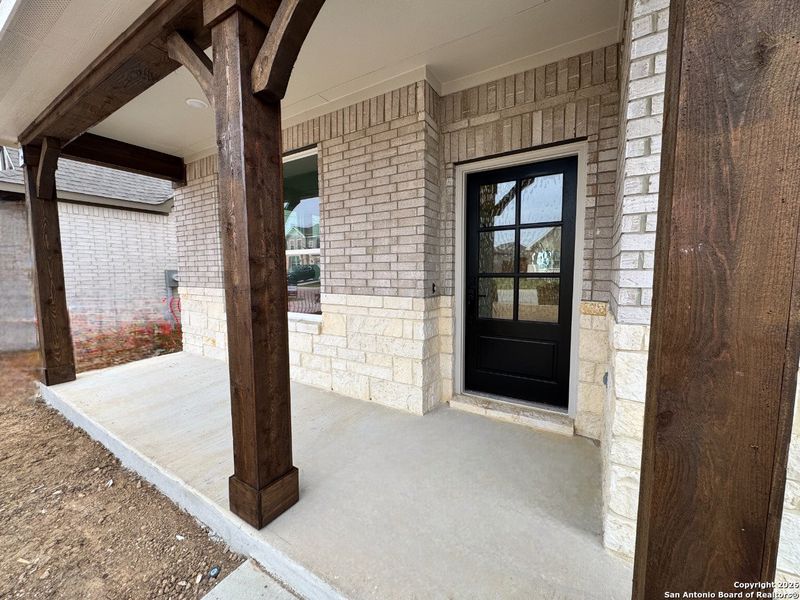 Exterior details and patio area of a home in Megan's Landing 50's, Castroville (Image 3).