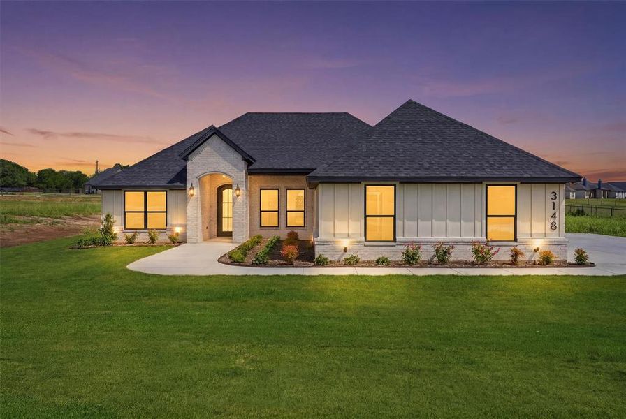 Front exterior of a new home in , Weatherford, TX, highlighting curb appeal (Image 25). Front exterior of a new home in , Weatherford, TX, highlighting curb appeal (Image 25).