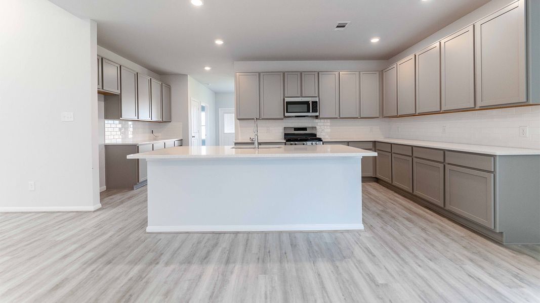 Furnished interior view inside a new home in Windrose Green, Angleton (Image 4).