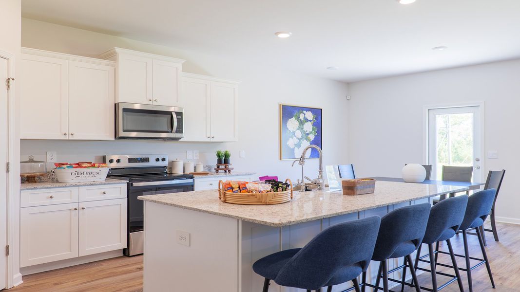Representative furnished interior of a home built from the The Carol by D.R. Horton in Misting Springs, Crawfordville (Image 6).