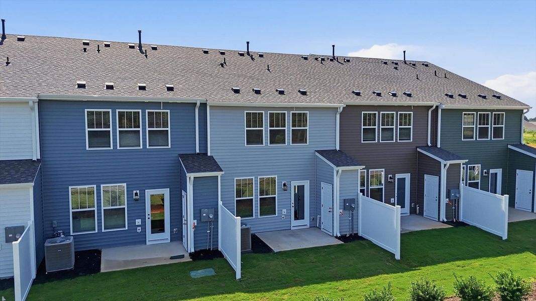 Vibrant rear outdoor space featuring a private patio and exceptional craftsmanship by DRB Homes Vibrant rear outdoor space featuring a private patio and exceptional craftsmanship by DRB Homes