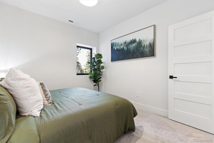 Large basement bedroom will accommodate a king size bed Large basement bedroom will accommodate a king size bed