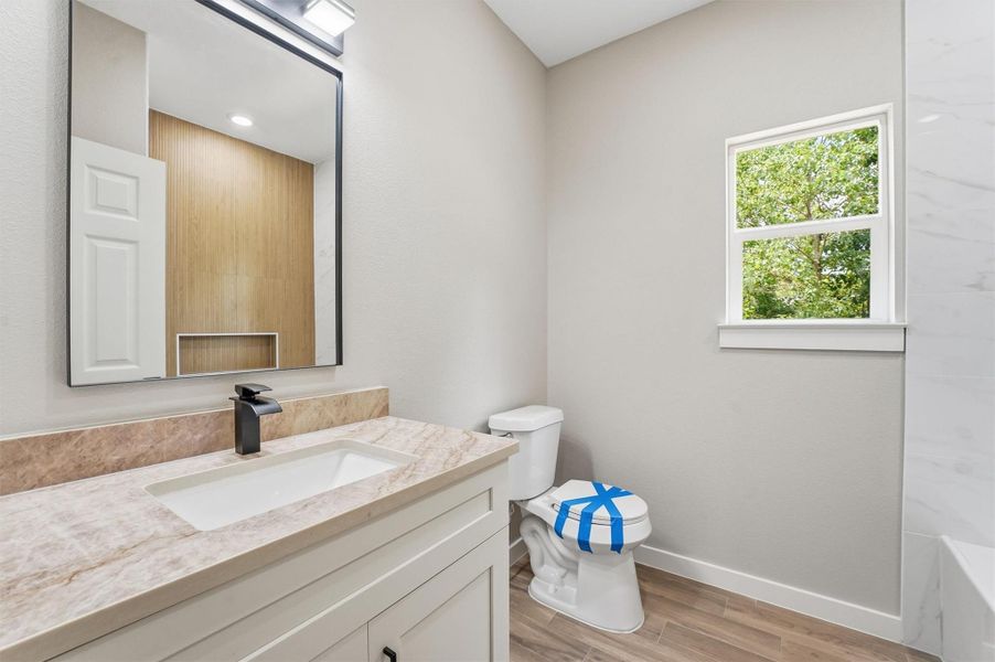 Furnished interior view inside a new home in , Conroe (Image 11).