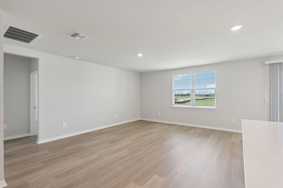 Furnished interior view inside a new home in Hampton Park - Classic Series, Vero Beach (Image 15).