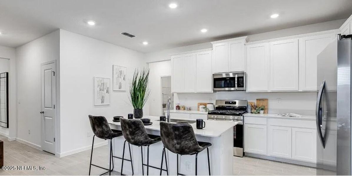 Furnished interior view inside a new home in Stillwater | Active Adult 55+: Stillwater - Villas, St. Johns (Image 9).