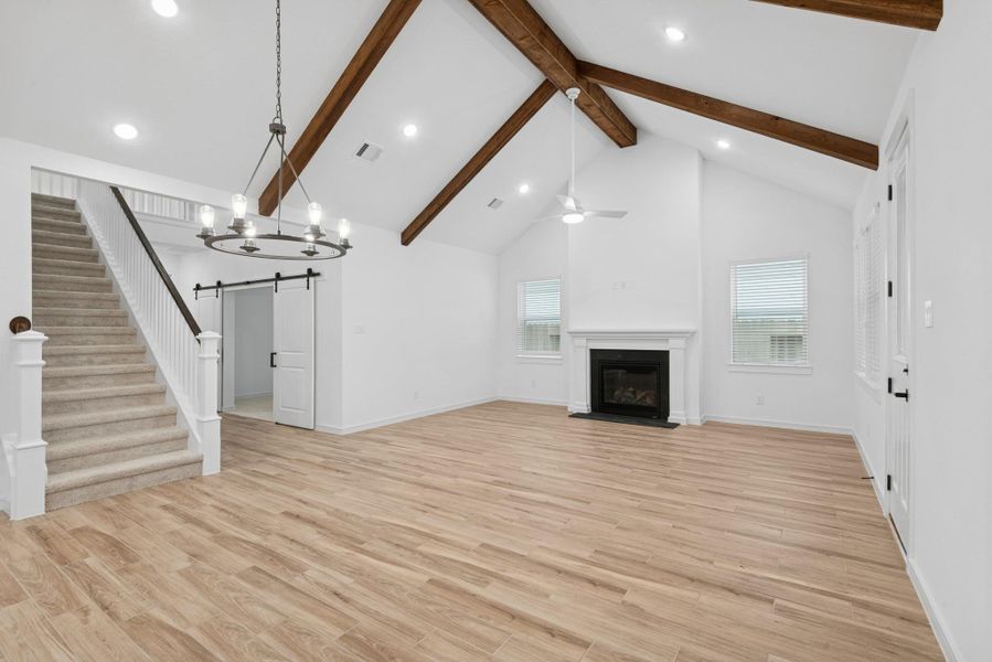 Charming dining area and great room with cozy fireplace