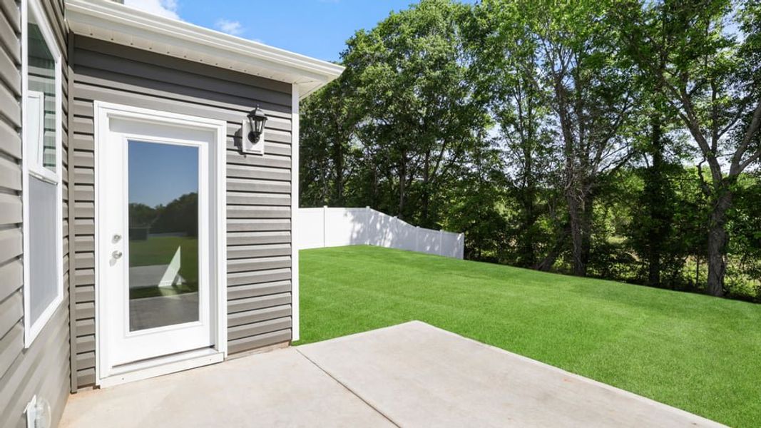 Exterior details and patio area of a home in Spring Ridge, Anderson (Image 3).