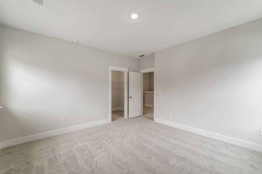 Spacious, unfurnished interior of a new home in Cottages at Lake Emory, Inman (Image 27). Spacious, unfurnished interior of a new home in Cottages at Lake Emory, Inman (Image 27).