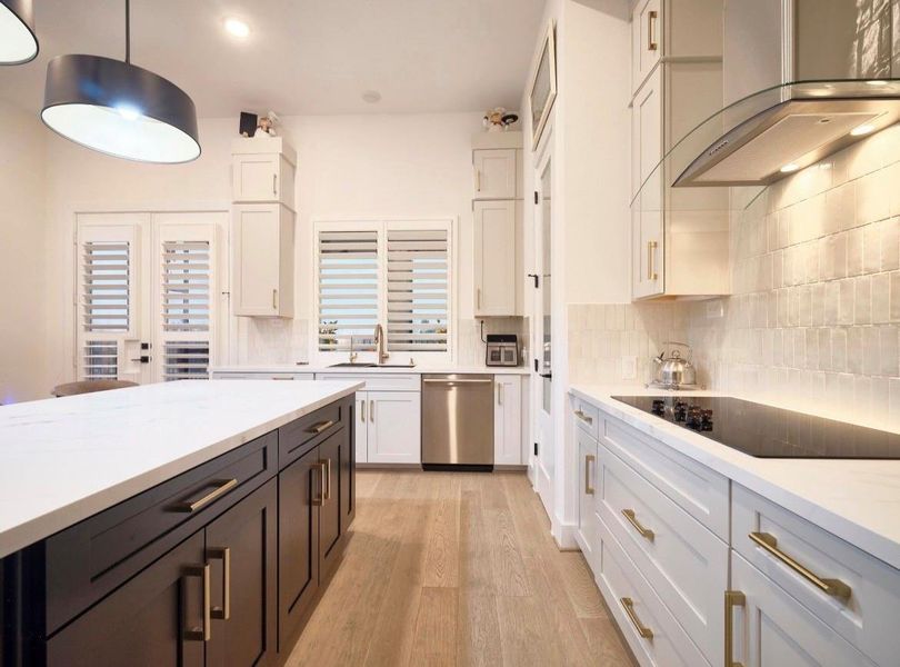 Custom cabinetry, porcelain countertops & premium finishes through out.