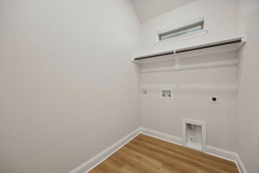 Representative unfurnished interior of a home built from the Caldwell by Chesmar Homes in Summer Crest, Crowley (Image 8).