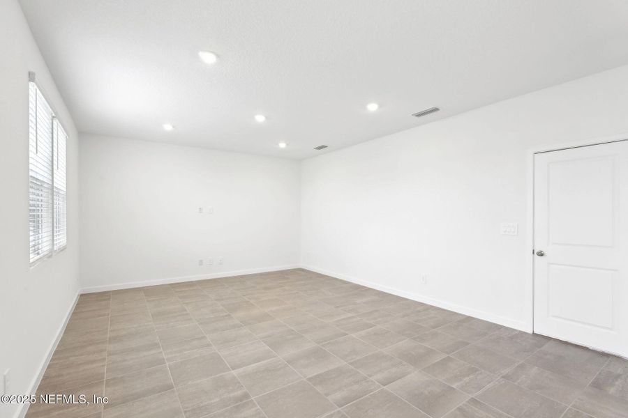 Spacious, unfurnished interior of a new home in Lakes at Bella Lago - Signature Series, Green Cove Springs (Image 21). Spacious, unfurnished interior of a new home in Lakes at Bella Lago - Signature Series, Green Cove Springs (Image 21).