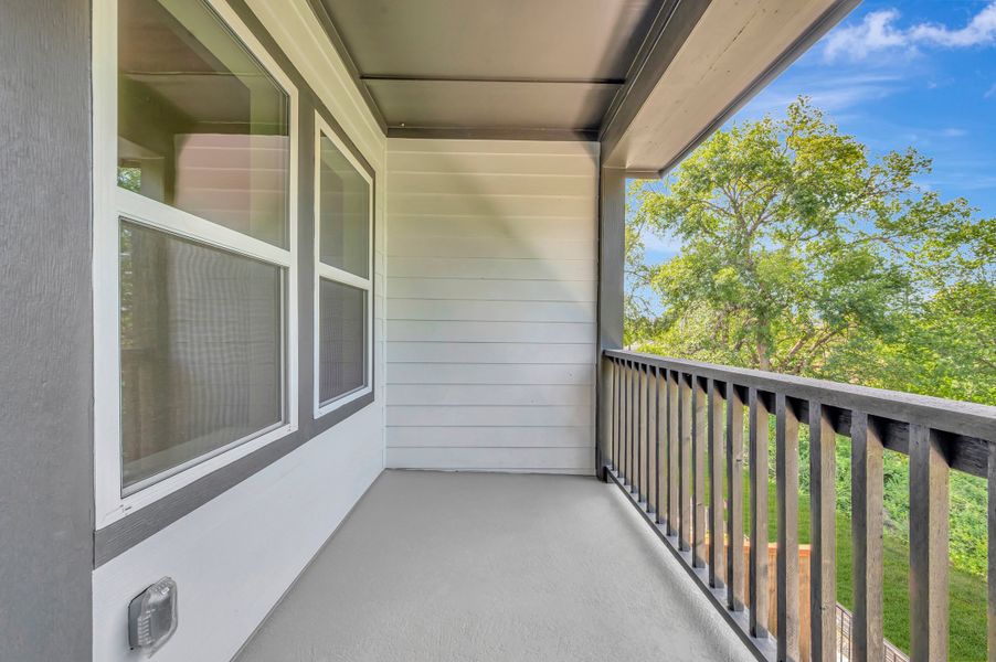 Exterior details and patio area of a home in Trails at Waterside - Garden Series, Fort Worth (Image 3). Exterior details and patio area of a home in Trails at Waterside - Garden Series, Fort Worth (Image 3).