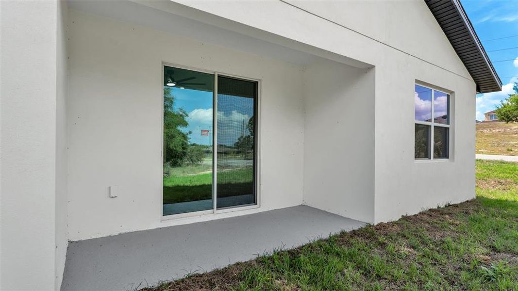 Exterior details and patio area of a home in , Davenport (Image 3).