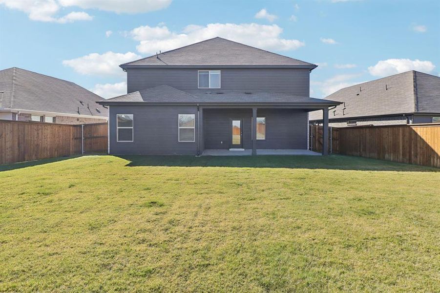 Exterior details and patio area of a home in , Farmersville (Image 4).