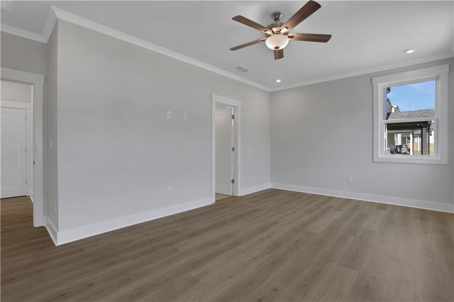Spacious, unfurnished interior of a new home in The Paddocks at Doc Hughes, Buford (Image 34).