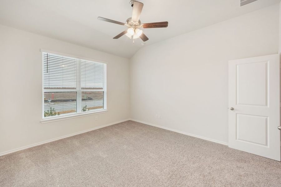 Representative exterior photo of a completed home built from the Joliet by Impression Homes in Heartland, Heartland, TX (Image 17).