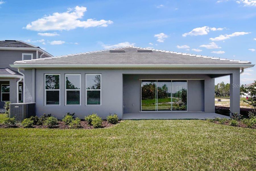 Exterior details and patio area of a home in Hammock at Two Rivers, Zephyrhills (Image 2).