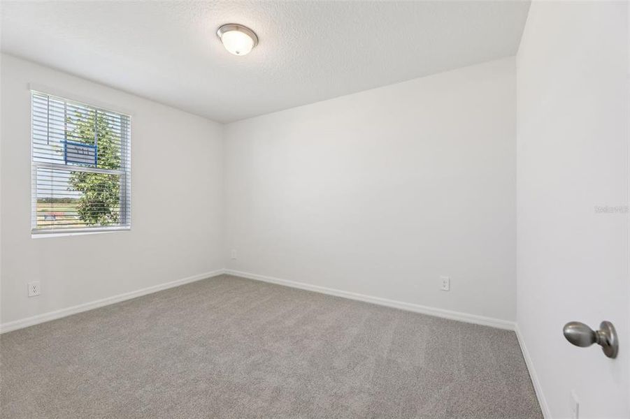 Spacious, unfurnished interior of a new home in Crosswinds - Signature Series, Haines City (Image 18).