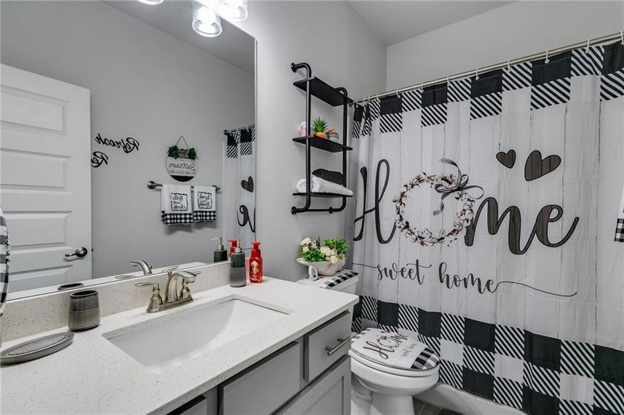 Furnished interior view inside a new home in Windmill Park, Carrollton (Image 7).