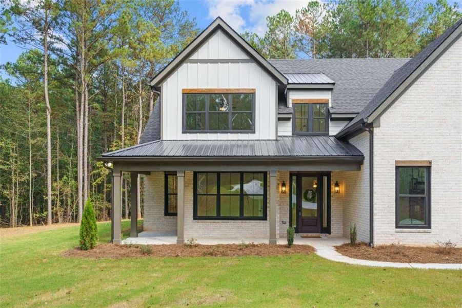 Front exterior of a new home in , Jenkinsburg, GA, highlighting curb appeal (Image 32).