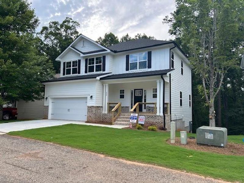 Front exterior of a new home in Habersham Meadows, Demorest, GA, highlighting curb appeal (Image 2).