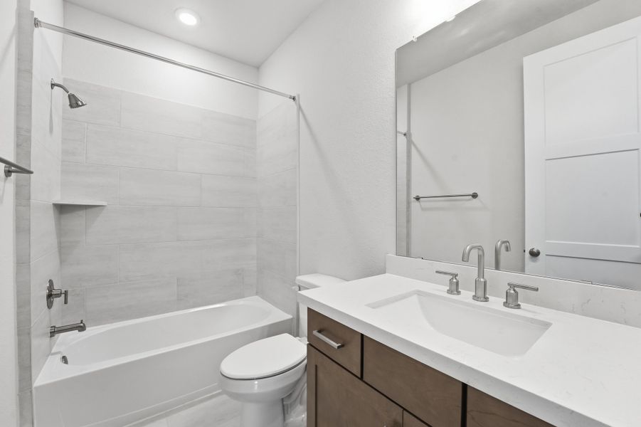 Furnished interior view inside a new home in Bridgeland, Cypress (Image 9).