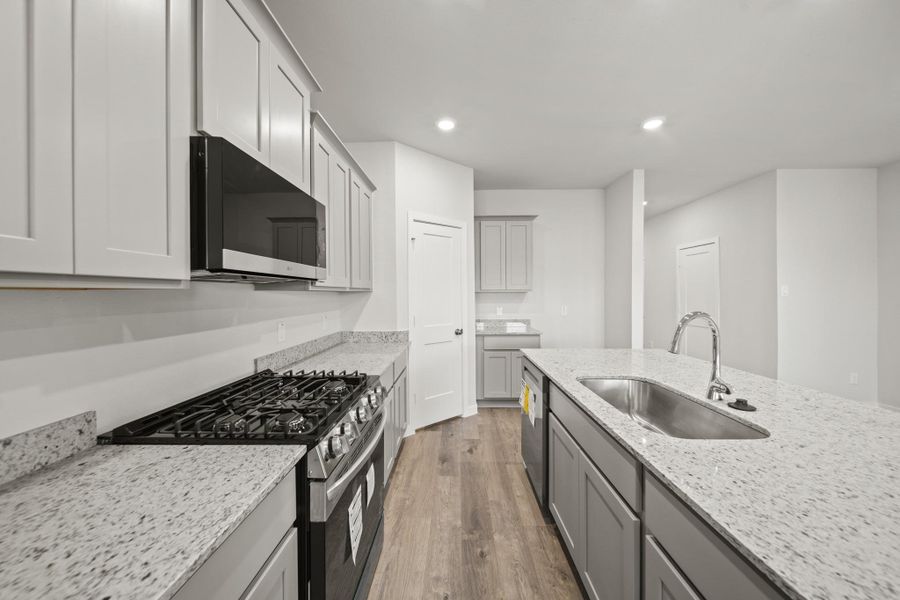 Furnished interior view inside a new home in Riverwood Ranch, Angleton (Image 6).