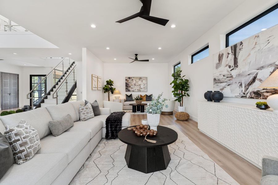 The full scale of this expansive living space is highlighted.