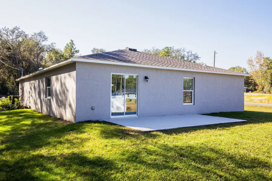 Exterior details and patio area of a home in Palm Bay, Palm Bay (Image 3).