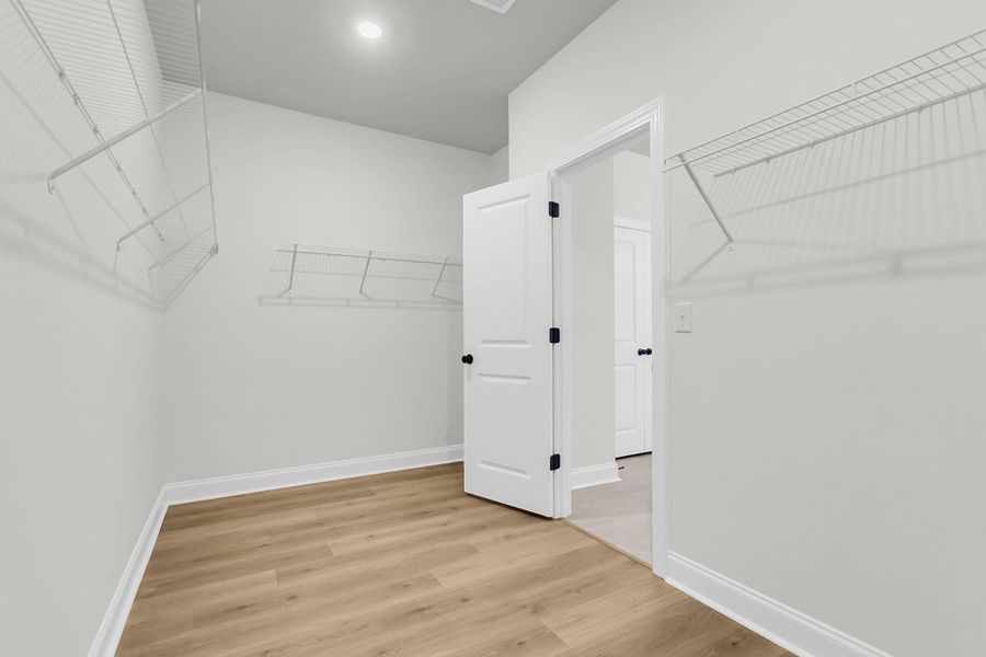 Spacious, unfurnished interior of a new home in Tidewater at Lakes of Cane Bay, Summerville (Image 30). Spacious, unfurnished interior of a new home in Tidewater at Lakes of Cane Bay, Summerville (Image 30).