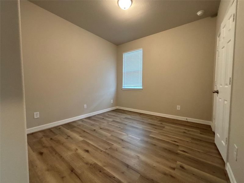 Spacious, unfurnished interior of a new home in Sunterra, Katy (Image 12).