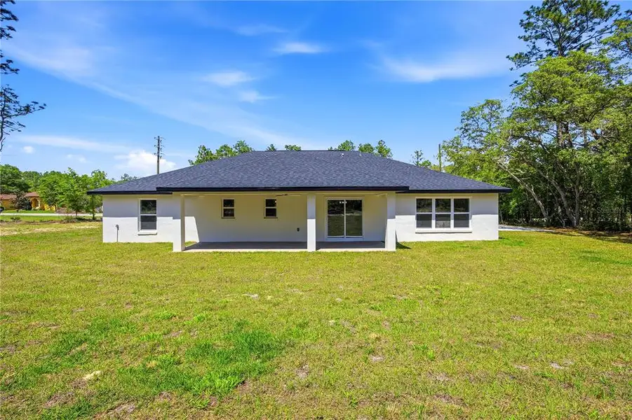 Exterior details and patio area of a home in , Ocala (Image 28).