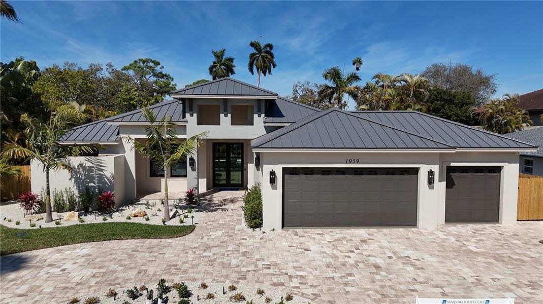 Front exterior of a new home in , Sarasota, FL, highlighting curb appeal (Image 25).
