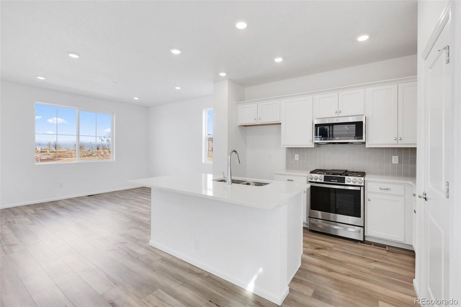 Furnished interior view inside a new home in The Casitas Collection at Windler, Aurora (Image 10). Furnished interior view inside a new home in The Casitas Collection at Windler, Aurora (Image 10).