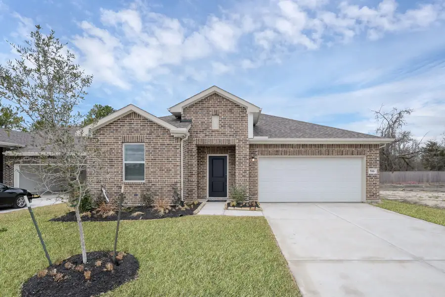 Front exterior of a new home in Aspire at The Reserve at Huntsville, Huntsville, TX, highlighting curb appeal (Image 1). Front exterior of a new home in Aspire at The Reserve at Huntsville, Huntsville, TX, highlighting curb appeal (Image 1).