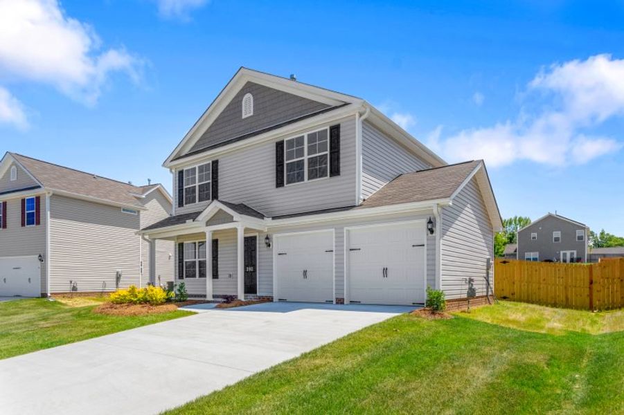 Representative exterior photo of a completed home built from the Dayton by Keystone Homes NC in Avondale, Greensboro, NC (Image 37). Representative exterior photo of a completed home built from the Dayton by Keystone Homes NC in Avondale, Greensboro, NC (Image 37).