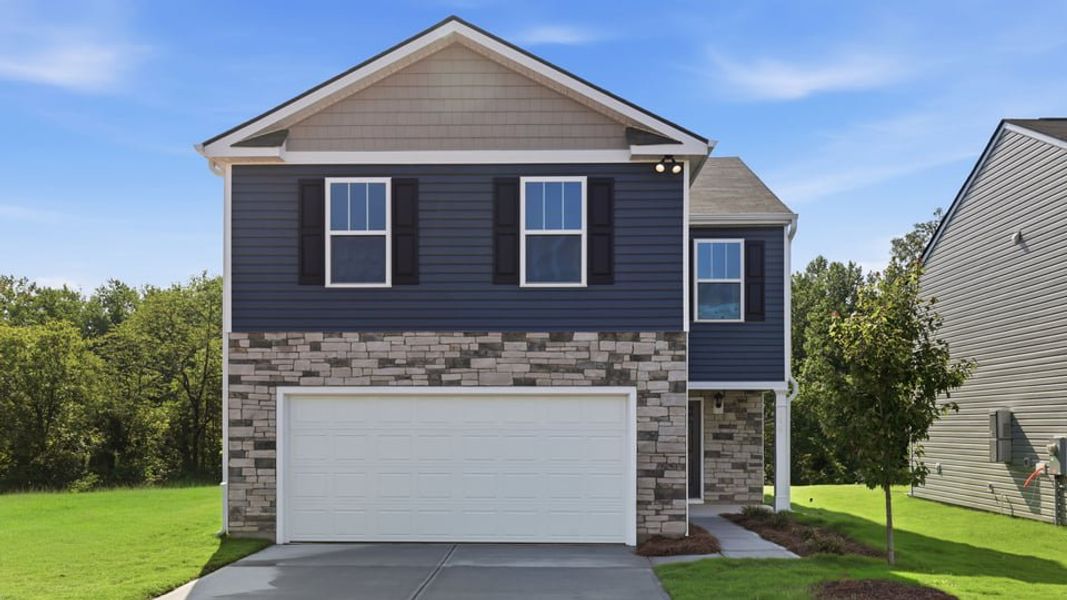 Front exterior of a new home in Cedar Gap, Fountain Inn, SC, highlighting curb appeal (Image 1). Front exterior of a new home in Cedar Gap, Fountain Inn, SC, highlighting curb appeal (Image 1).