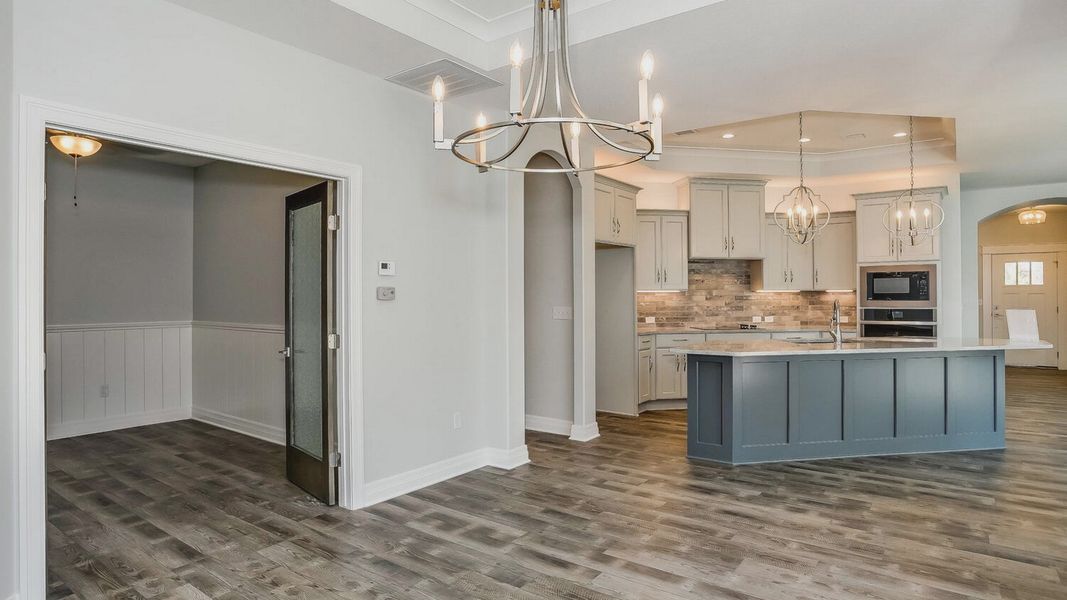 Representative furnished interior of a home built from the Portico Tandem Garage by Perfection Builders in The Courtyards at The Heritage, Andover (Image 8).