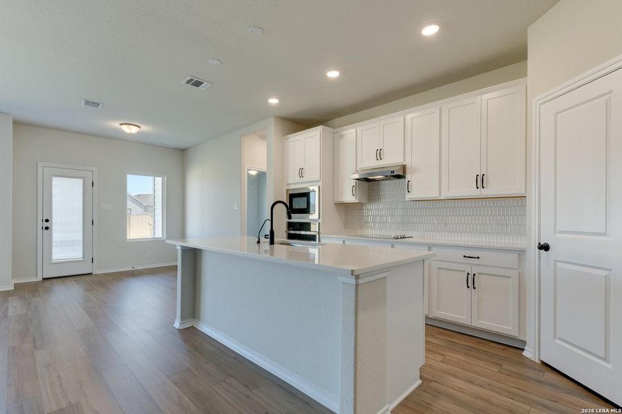 Furnished interior view inside a new home in Hennersby Hollow, San Antonio (Image 11).