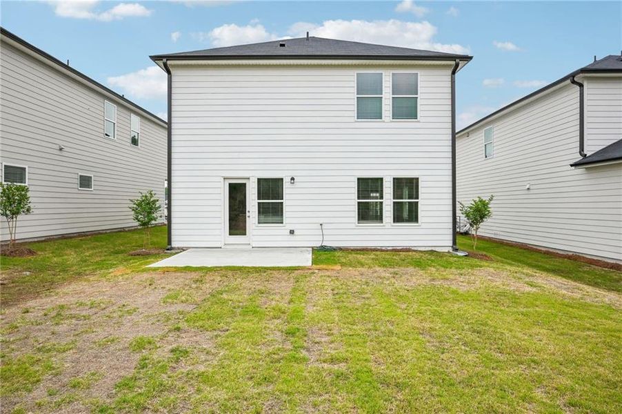 Front exterior of a new home in Hawthorne Station, College Park, GA, highlighting curb appeal (Image 27).